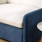 Poltrona singola in ciniglia blu/multicolore, con cuscini decorativi
