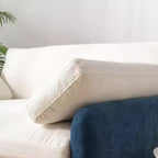 Poltrona singola in ciniglia blu/multicolore, con cuscini decorativi