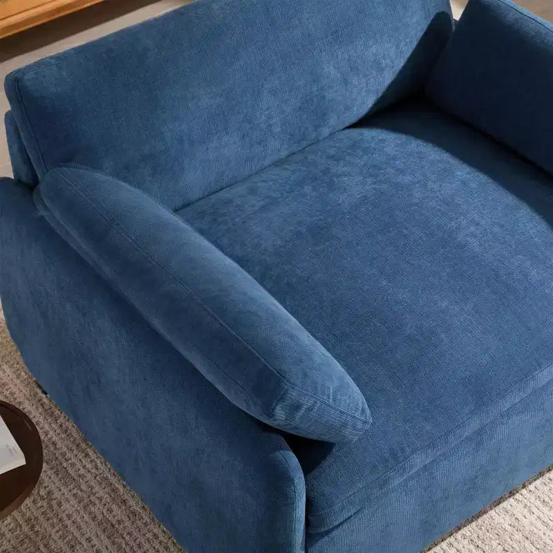 Poltrona singola in ciniglia blu/multicolore, con cuscini decorativi