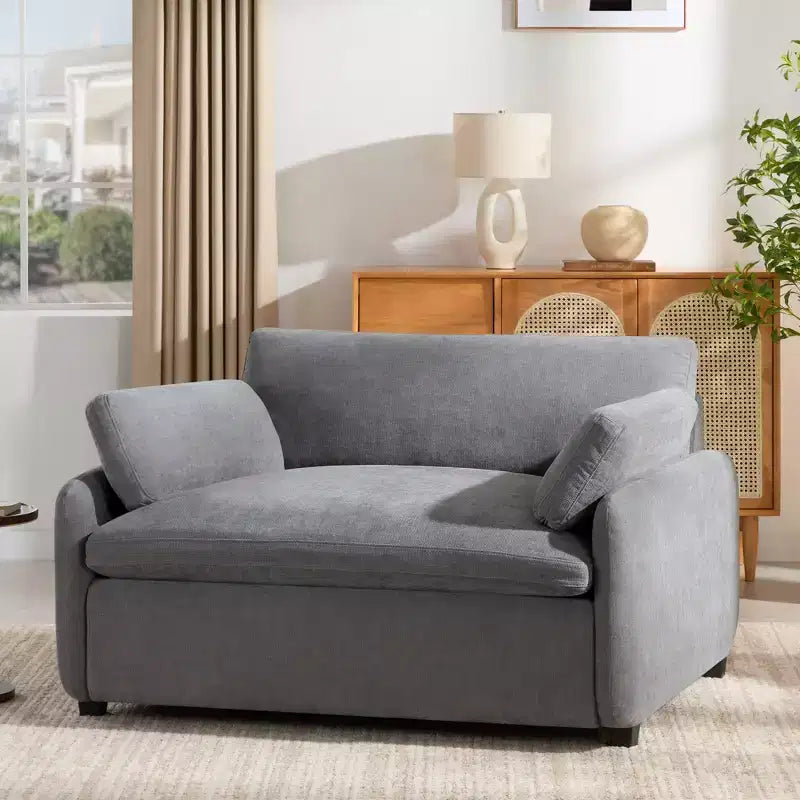 Poltrona singola in ciniglia blu/multicolore, con cuscini decorativi
